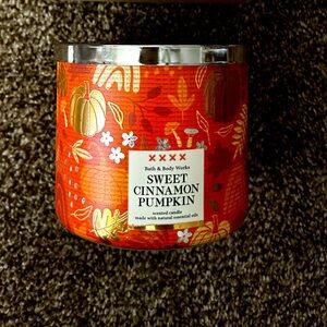 A 3 wick scented candle from Bath and Body Works.